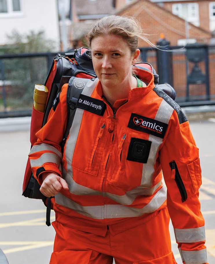 Dr Abbi Forsyth in EMICS uniform with medical kit